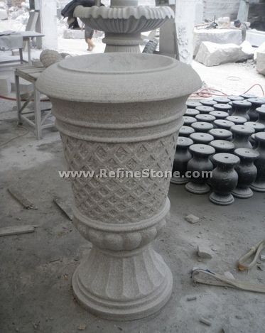 hand carved flowerpot