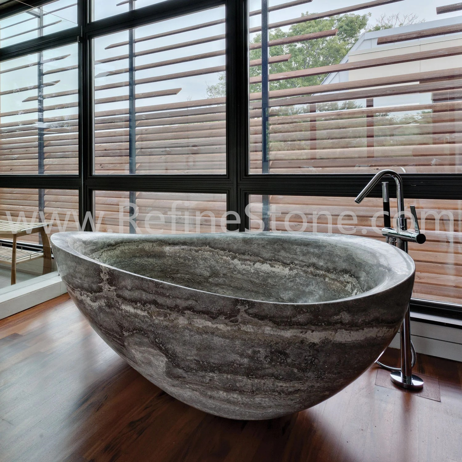 Silver travertine bathtub